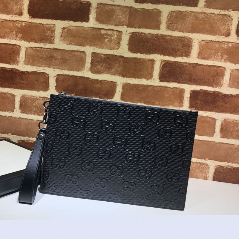 G*u*i clutch bags